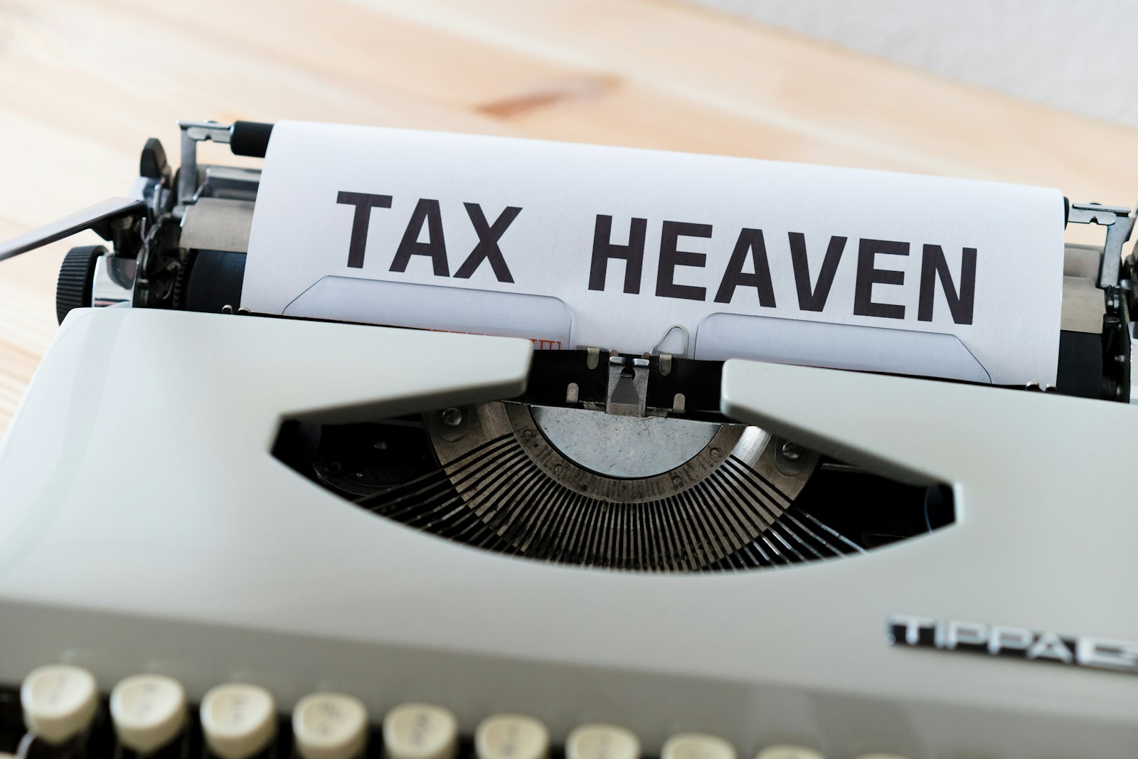 Typewriter with tax paperwork theme